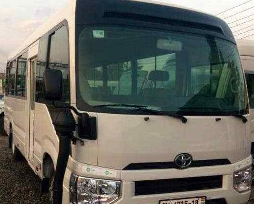Rent air-conditioned Toyota Coaster Bus - Ghana