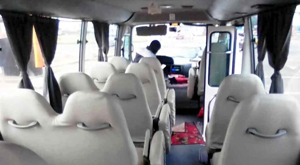 Hire 29-passenger Toyota Coaster air-conditioned bus Accra Ghana.